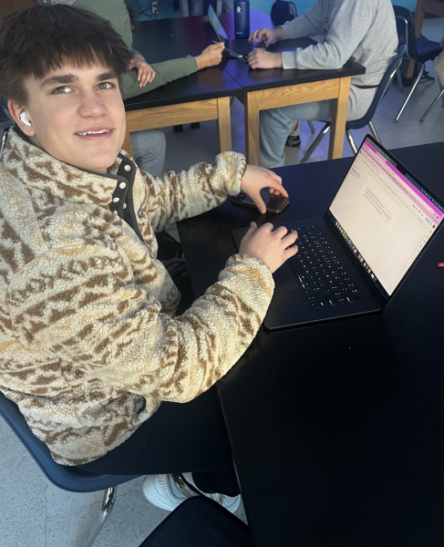 Senior Andrius Marchertas catches up on some school work.
